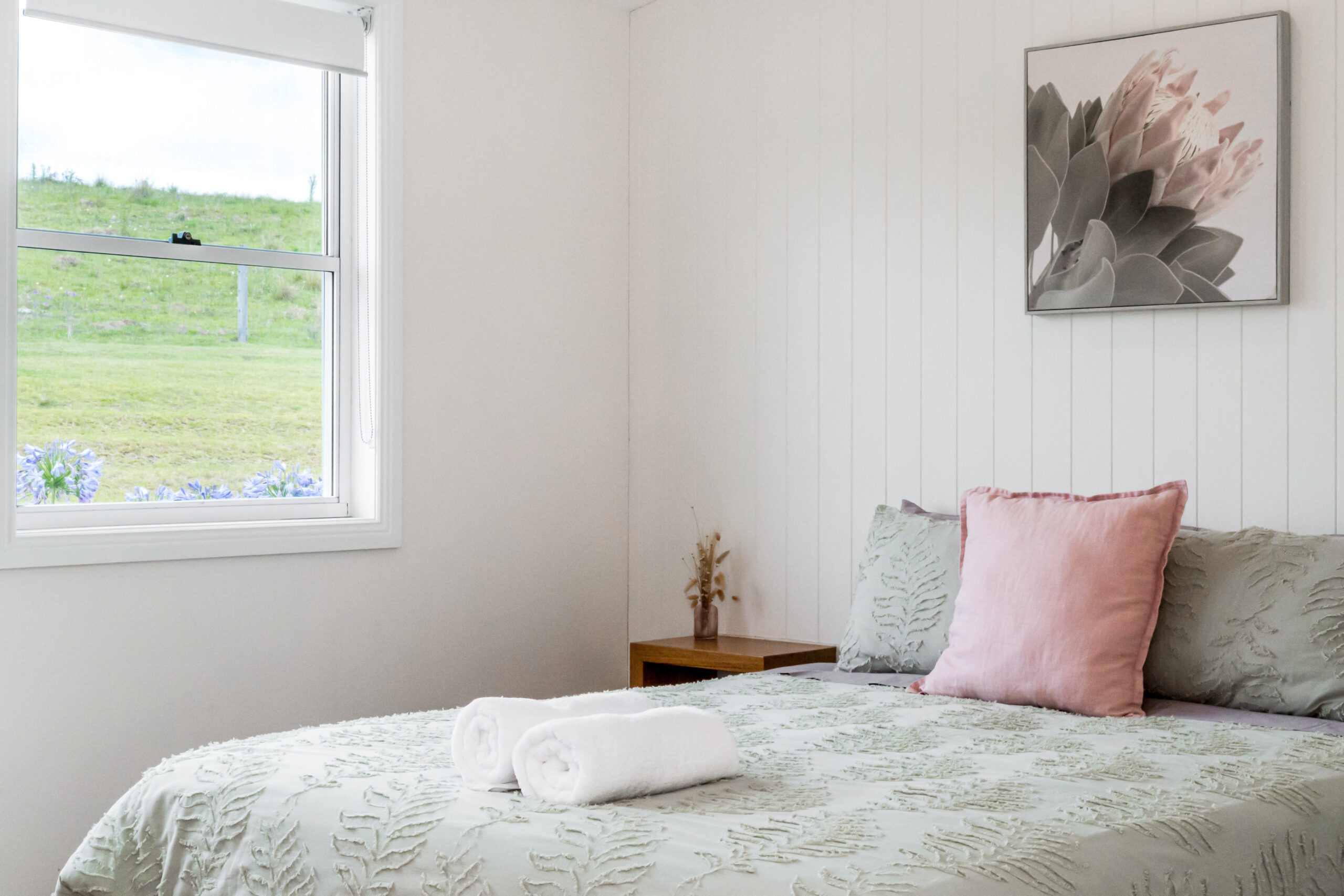 Scenic view of the countryside surrounding Forget Me Not Farm Cottages, with rolling hills and lush greenery.